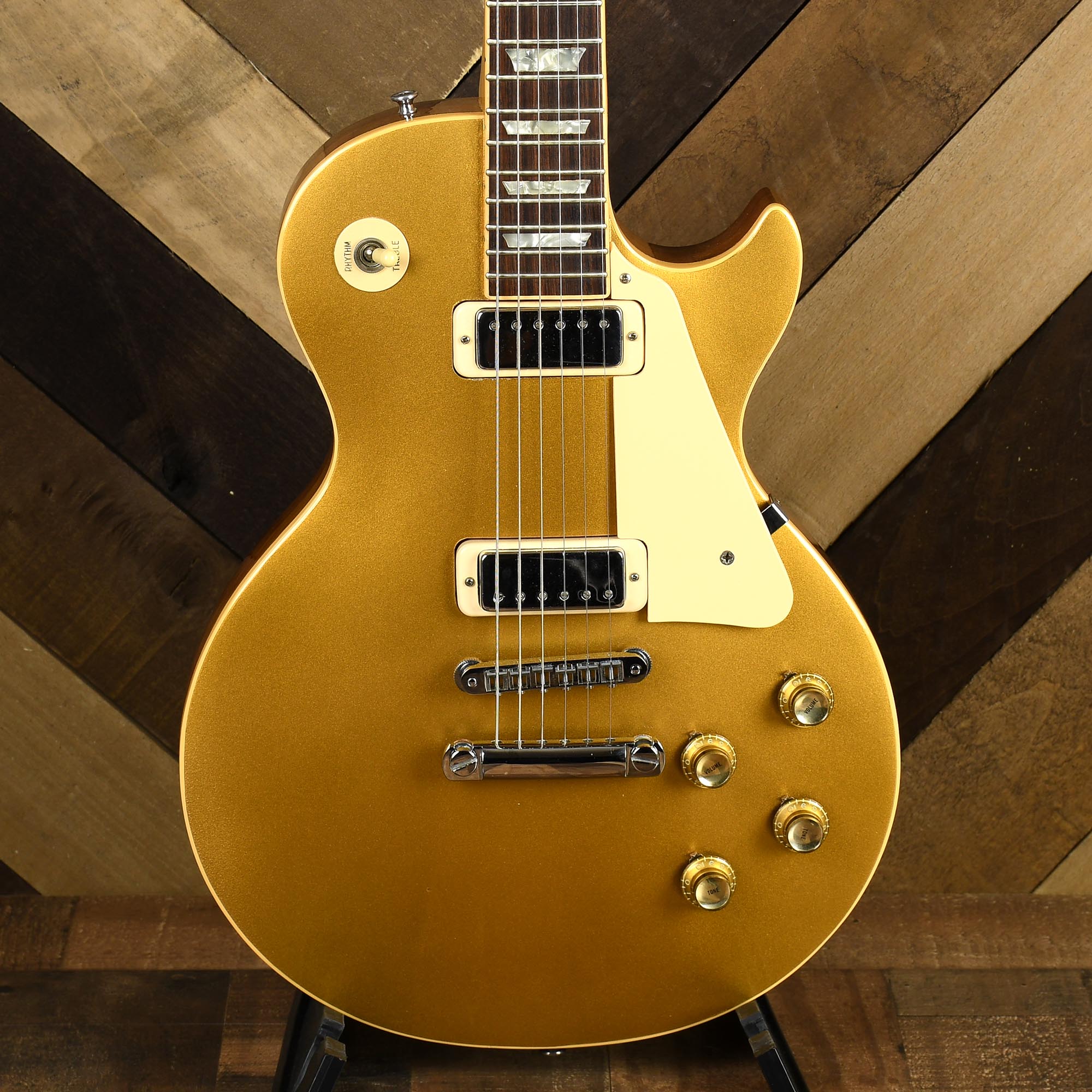 strand kommentar Hyret Gibson 1975 Les Paul Deluxe Gold Top With OHSC - Used